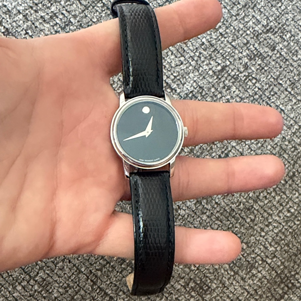 Movado Silver Case Black Strap watch